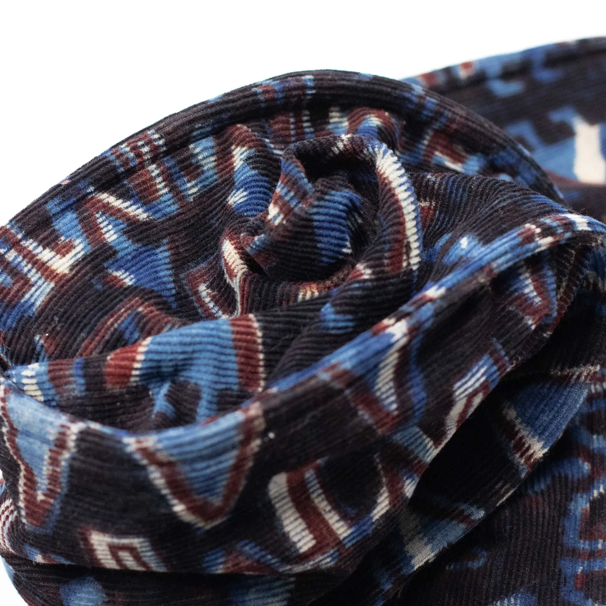 Quilted scarf in black, light blue, and red handblock printed cotton corduroy